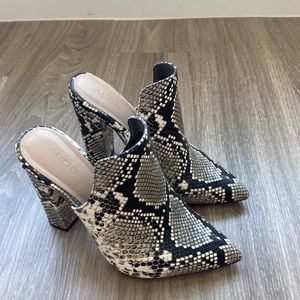 Snake skin slip on mules